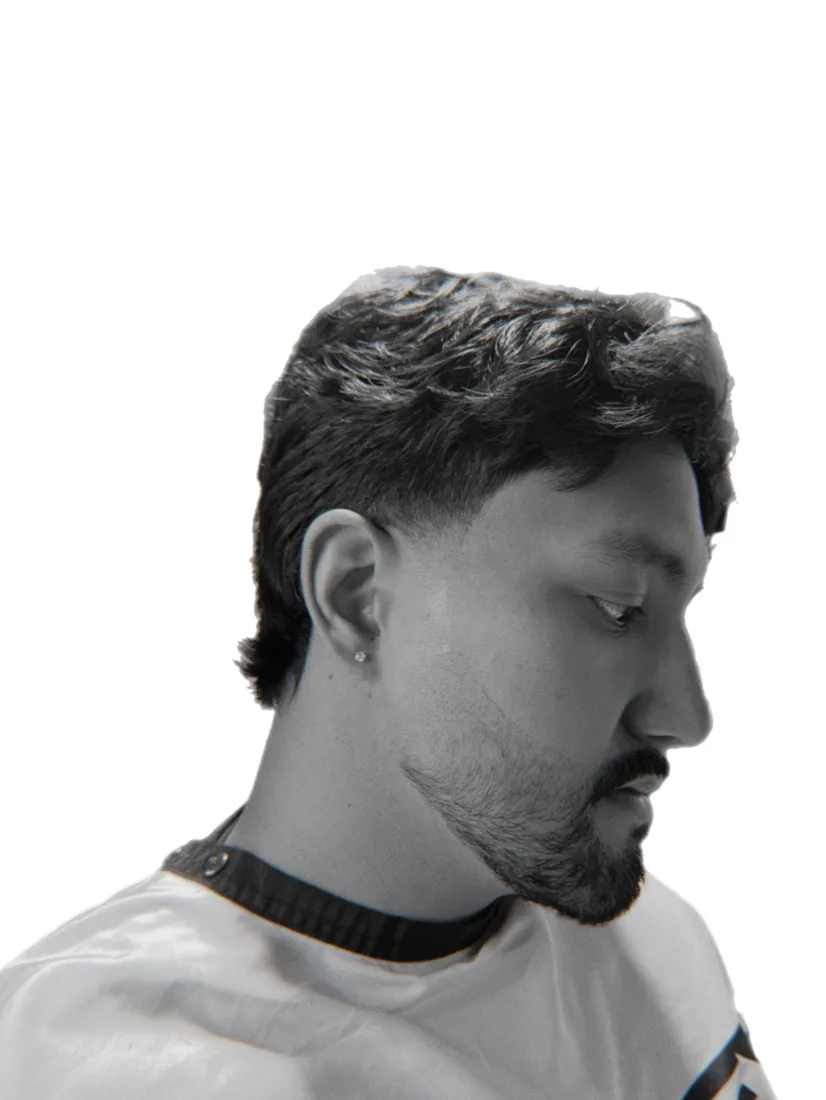 A sculpted beard in profile